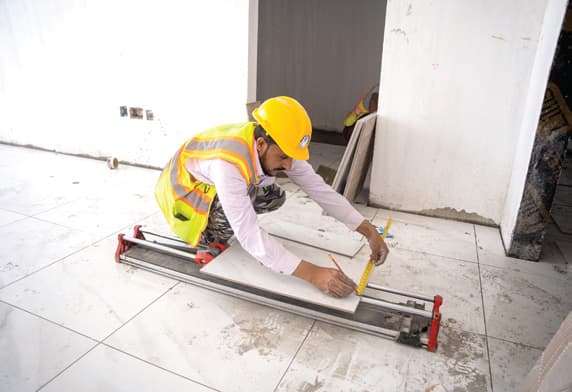 Floor tiling and civil works by The Hub Maintenance UAE